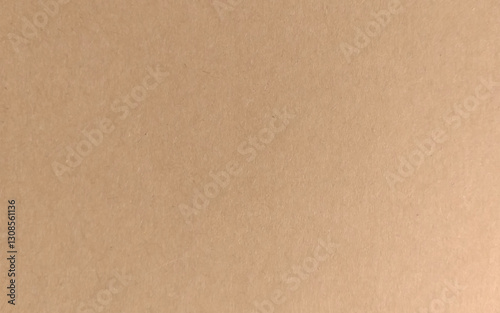 Background of brown kraft paper or cardboard texture. Abstract pattern of beige rough carton, old paper sheet, parchment or papyrus surface
