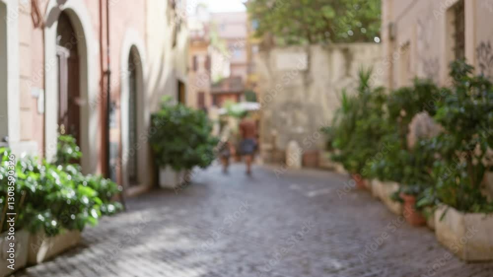 Defocused scene of a man walking dog in the cobblestone streets of rome's old town, italy, showcasing outdoor bokeh with historical background out of focus. Defocused scene of a man walking dog in the cobblestone streets of rome's old town, italy, showcasing outdoor bokeh with historical background out of focus.