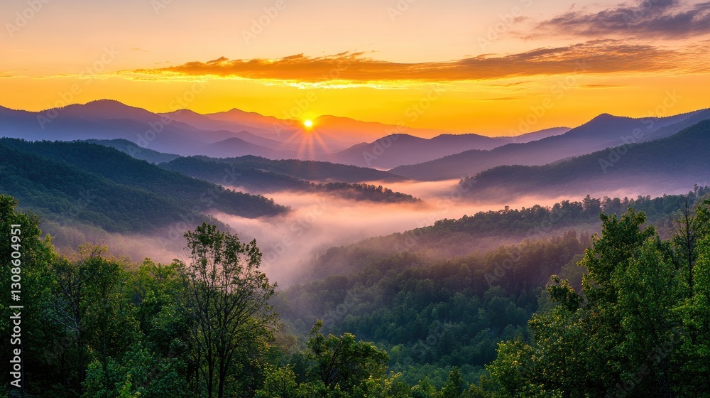 Obraz premium A majestic sunrise view of a mountain landscape, with golden light brightening the peaks and mist drifting gently through the valleys