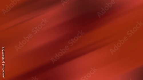 Dark red hues in a blurred red and brown background, suitable for abstract designs, backgrounds, textures, and artistic projects.