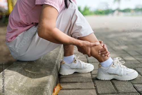 Ankle injury,feeling pain,problems of Anterior Ankle Impingement or Tibialis Anterior Tendon,painful in the joint connecting foot with the leg,woman with ankle sprain,twist of the ligaments of a joint