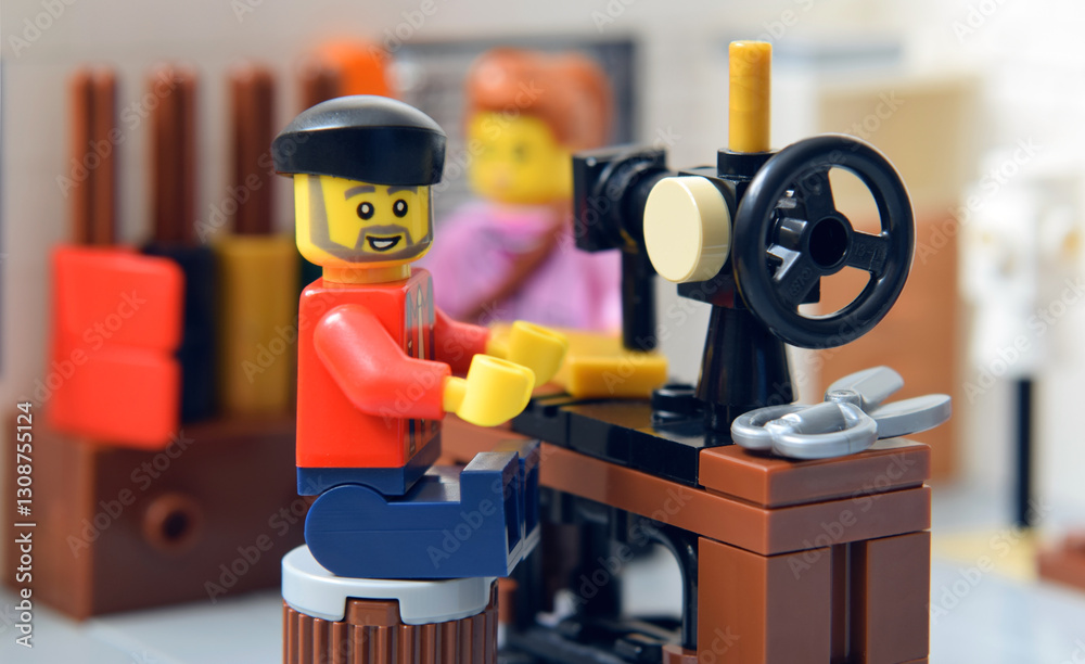Naklejka premium Editorial illustrative image of lego minifigure is sewing on machine clothes. 