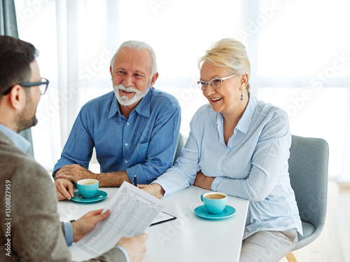 meeting agreement investment couple contract advice retirement consultation house finance senior elderly insurance senior couple office