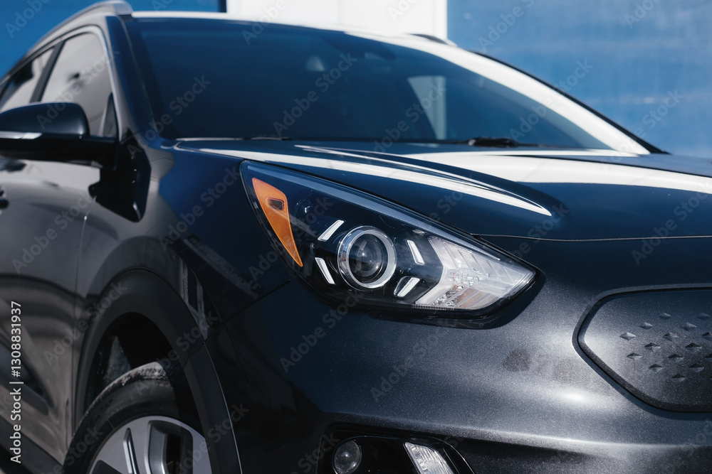 A stylish and modern electric car. fast charging port. Exterior details. A stylish and modern electric car. fast charging port. Exterior details.