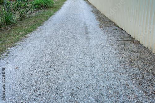 Photo of a gravel road in a garden