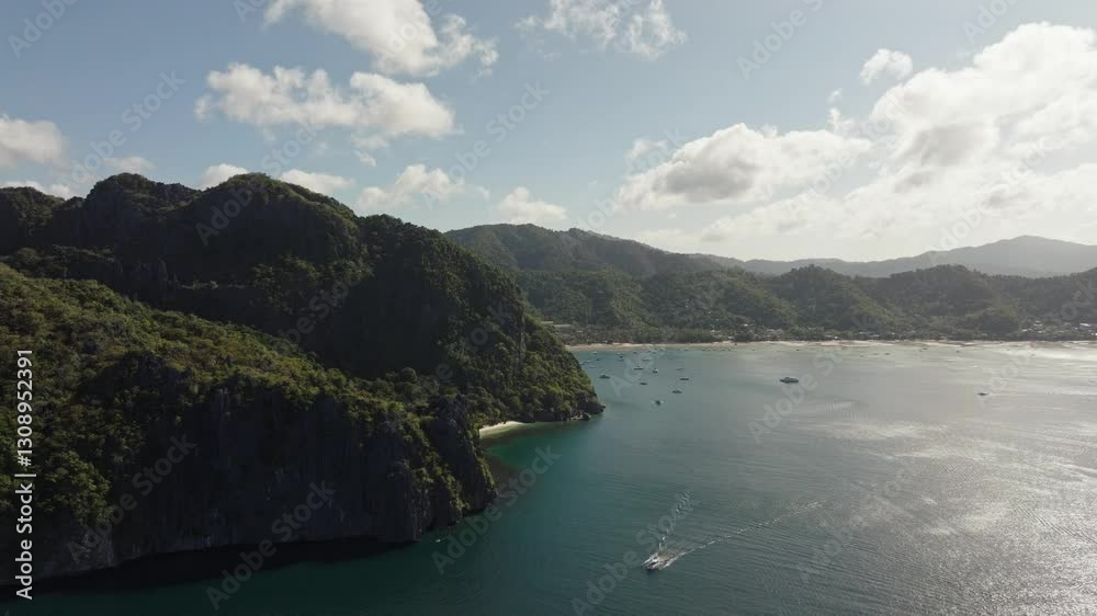Drone flight over Corong Corong Beach with boats along the shore, offering a scenic view of the beach and Las Cabanas in the distance.
Drone flight over Corong Corong Beach with boats along the shore, offering a scenic view of the beach and Las Cabanas in the distance.