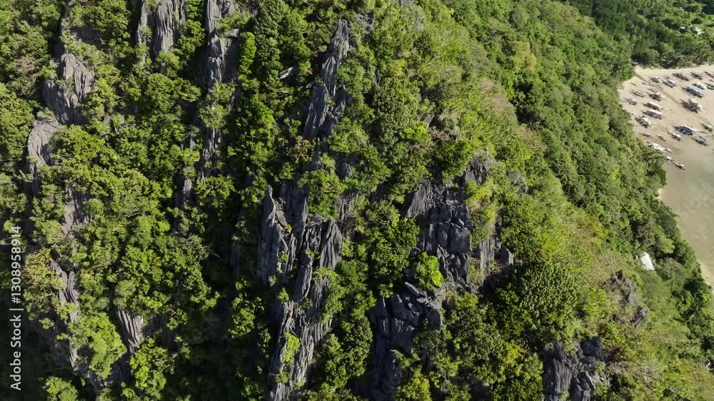 Drone flight over Corong Corong Beach with boats along the shore, offering a scenic view of the beach and Las Cabanas in the distance.
Drone flight over Corong Corong Beach with boats along the shore, offering a scenic view of the beach and Las Cabanas in the distance.