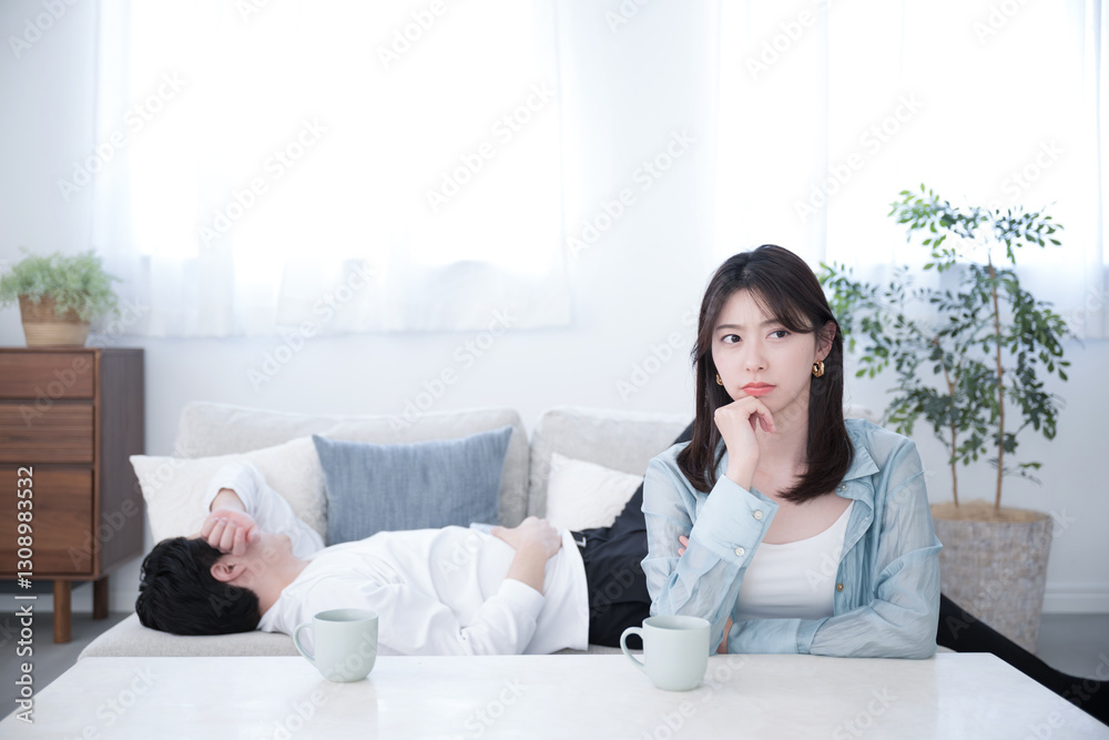 A difficult image of a couple fighting because the husband sleeps around on holidays Negative image of a wife's angry, troubled, and distressed face A difficult image of a couple fighting because the husband sleeps around on holidays Negative image of a wife's angry, troubled, and distressed face