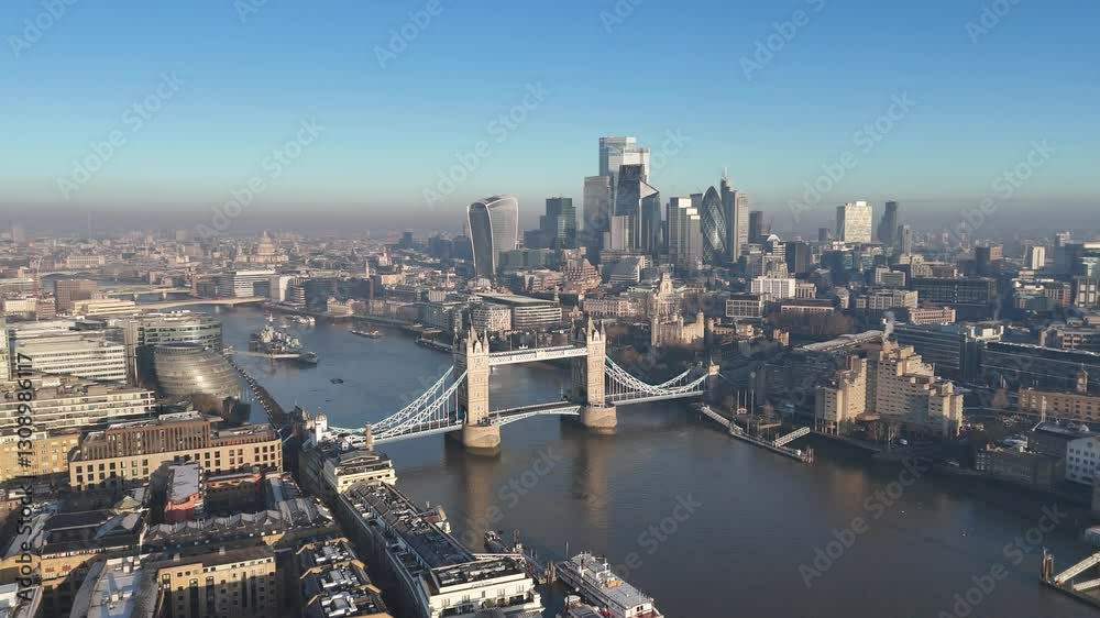 Stunning aerial drone footage of Tower Bridge and London’s modern skyline. A sweeping panoramic view capturing the city’s iconic blend of history and innovation. A unique perspective!.