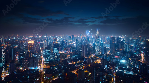 Wallpaper Mural Aerial View of Illuminated City at Night with Blue Tones and Dense Skyscrapers Torontodigital.ca