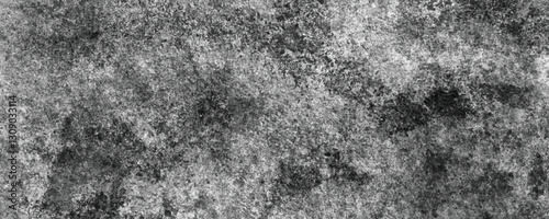 The Organic and Natural Aging of a Deeply Textured Cement Wall with Scratches and Stains

