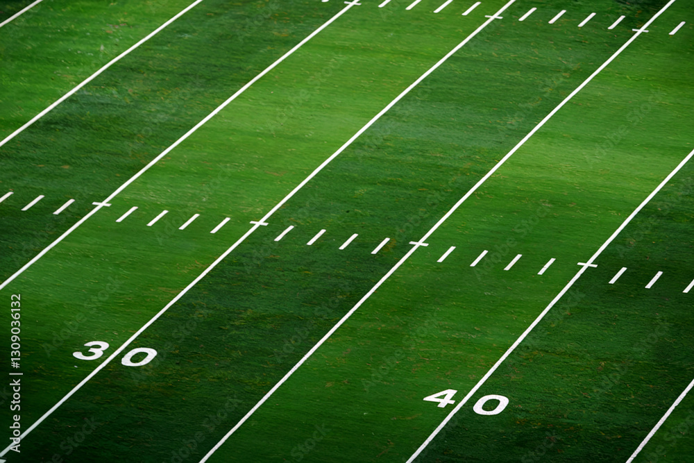 Obraz premium Green American Football Field Marked with White Yard Lines