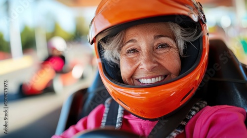 Senior woman enjoys thrilling ride in a go-kart on a sunny track