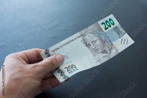 Photos Moeda brasileira, nota de 200 reais.