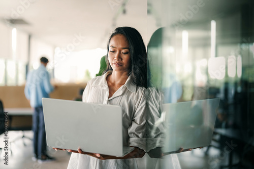Group of young multi-ethnic startup business team collaborating on project in modern office Free Download Group of young multi-ethnic startup business team collaborating on project in modern office - GFXLoad