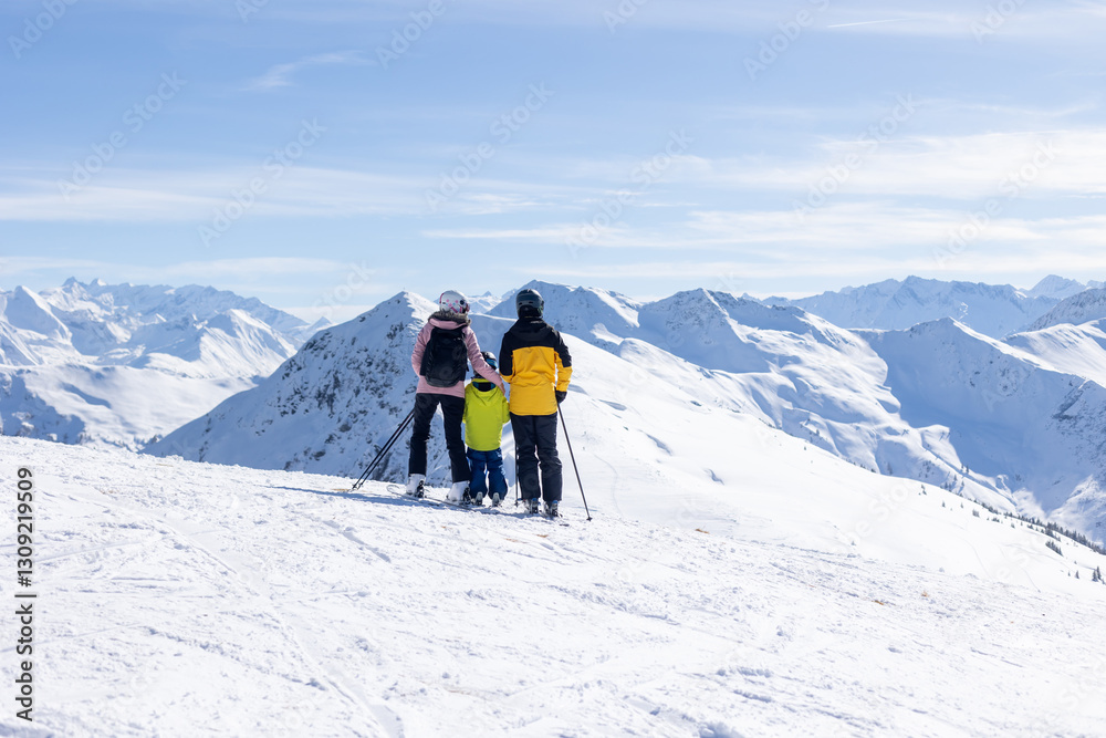 Happy family with children, school kids in winter ski resort, skiing winter time Happy family with children, school kids in winter ski resort, skiing winter time