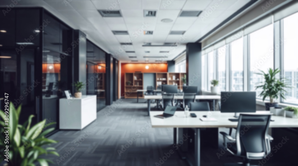 Ultra modern office interior. Blurred background with comfortable workplace with contemporary furniture, computers and green plants Ultra modern office interior. Blurred background with comfortable workplace with contemporary furniture, computers and green plants