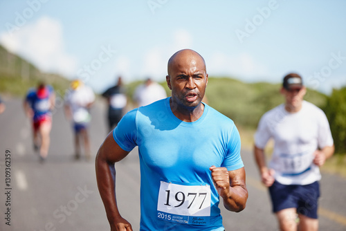 Sweating, man and running marathon in road for endurance challenge, long distance workout and intense cardio. Sports, athlete and group with exercise in nature for fitness race, contest and stamina