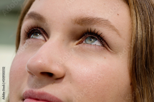 woman looking up, eye close up