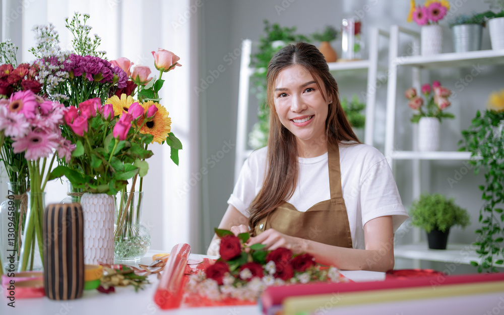 Cute Asian woman preparing bouquets for customer orders, Small business owner. Cute Asian woman preparing bouquets for customer orders, Small business owner.