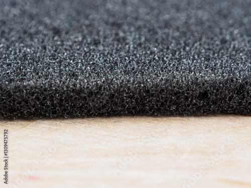 Polyurethane foam material for noise insulation and packaging, efficient and lightweight, ideal for sound protection.