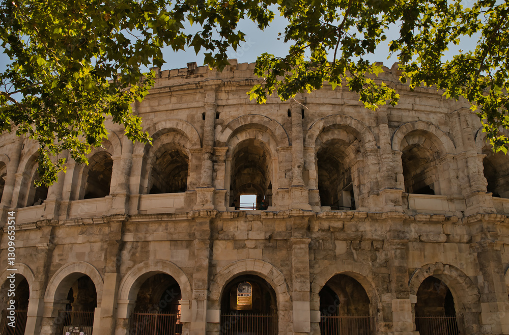 Obraz premium Roman amphitheater located in the French city of Nîmes, in the department of Gard, in the Occitania region Nîmes, in the Occitania region of southern France 