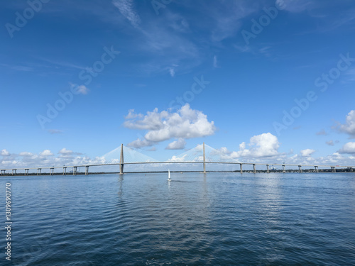 The Arthur Ravenel Jr Bridge spanning across Charleston Bay in South Carolina with sailboats