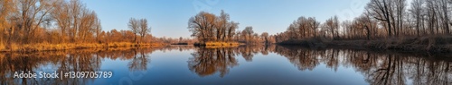 Beautiful river landscape with reflections and autumn trees