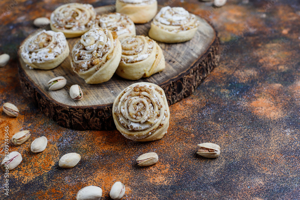 Delicious homemade meringue roll round cookies with nuts.