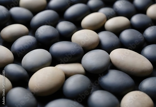 Minimalistic background/backdrop. Black round stones.