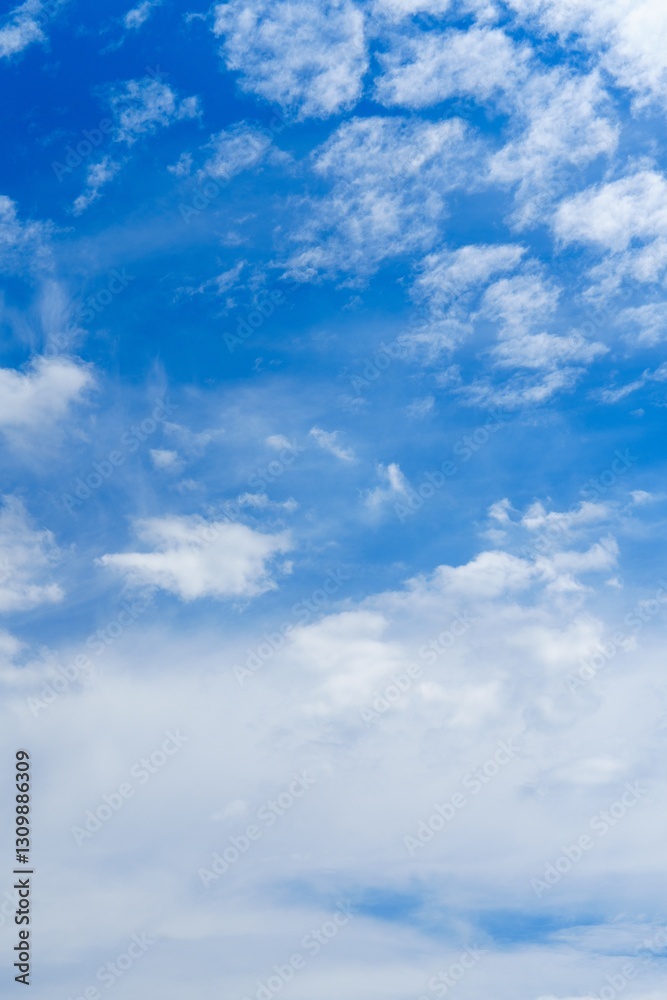 A breathtaking view of a clear blue sky adorned with fluffy white clouds, ideal for use as a background in various creative projects. This serene image evokes a sense of peace and tranquility. A breathtaking view of a clear blue sky adorned with fluffy white clouds, ideal for use as a background in various creative projects. This serene image evokes a sense of peace and tranquility.