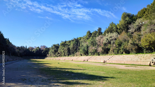 Fototapeta Naklejka Na Ścianę i Meble -  Photo of the ancient Olympic sadium on Monte Smith Hill in Rhodes, Greece. Once hosting the Haleion Games for Helios, it was restored by the Italians during their early 1900s occupation of the island.