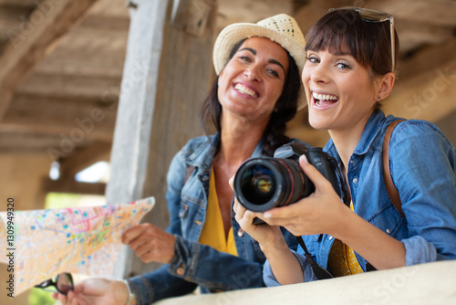 happy brightful positive moments of two stylish girls photo