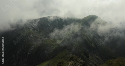 High mountain clouds in wind blowing