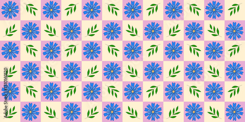 Seamless pattern with blue cornflowers and green branches on checked pink yellow background, vector