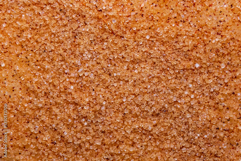 Sanding Sugar with cinnamon powder close-up. Granulated sugar on raw dough - macro photo. Natural food background