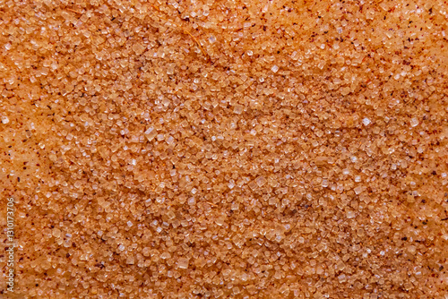 Foto Sanding Sugar with cinnamon powder close-up