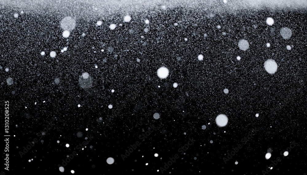 Obraz premium falling snowflakes on black overlay particles