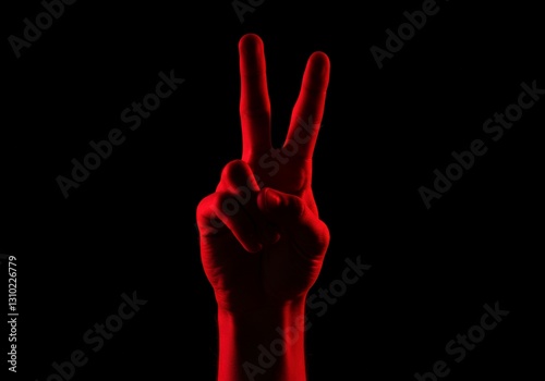 A symbolic hand sign for peace and unity, dramatically lit with vibrant dual-color lighting.