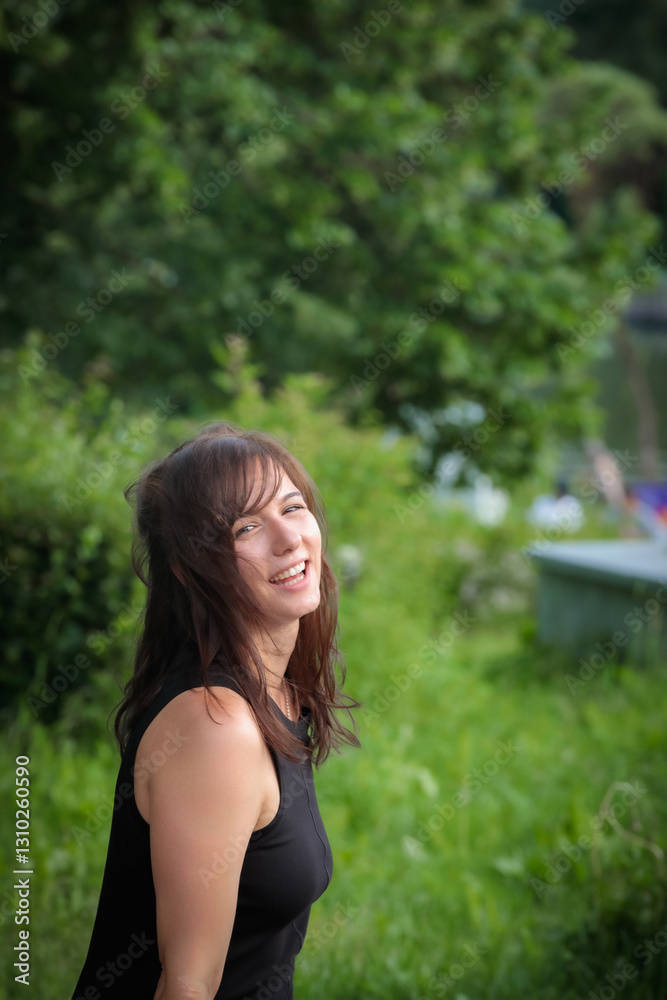 Girl with a smile on a park bench Girl with a smile on a park bench