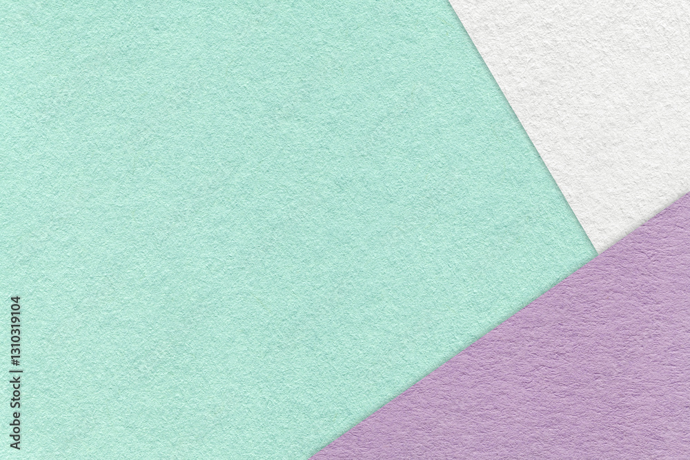 Texture of craft light green color paper background with white and purple border. Vintage abstract mint cardboard. Texture of craft light green color paper background with white and purple border. Vintage abstract mint cardboard.