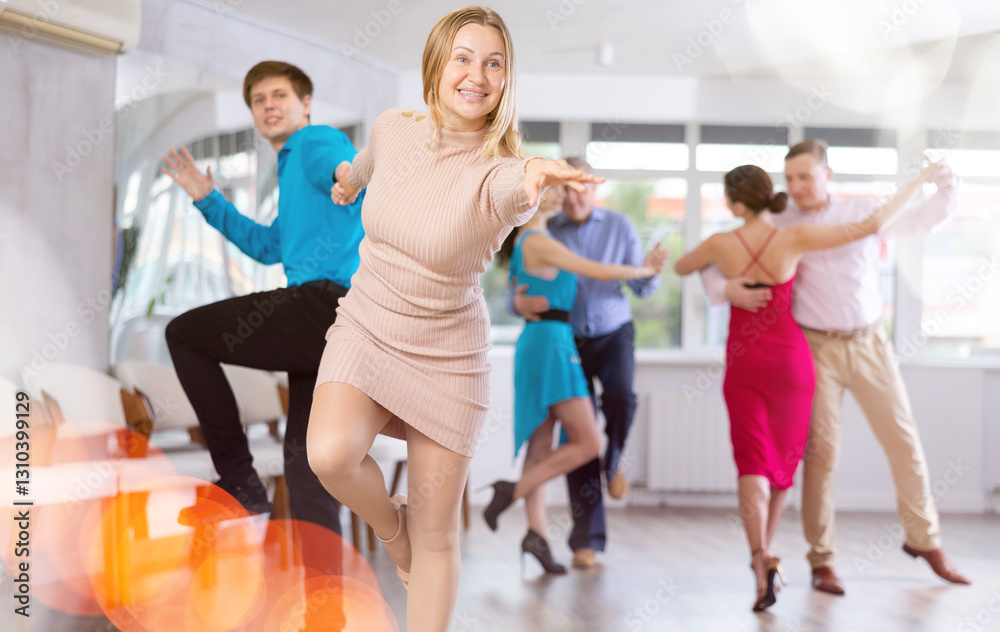 Fototapeta premium Adult woman rehearsing and dancing in dance class