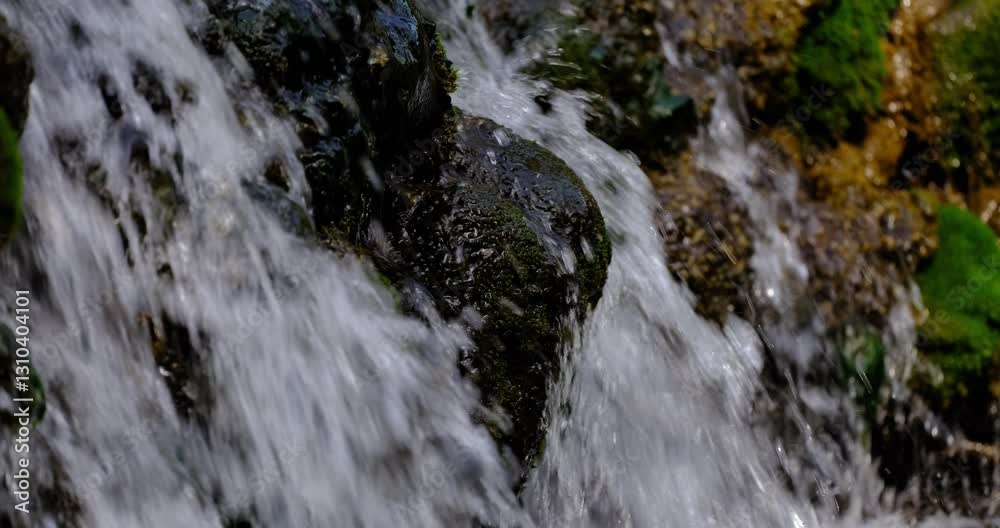 water flowing over rocks