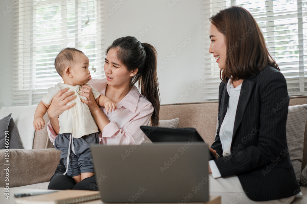 A businesswoman meets a mother holding her baby, discussing work-life balance in a home setting. A businesswoman meets a mother holding her baby, discussing work-life balance in a home setting.