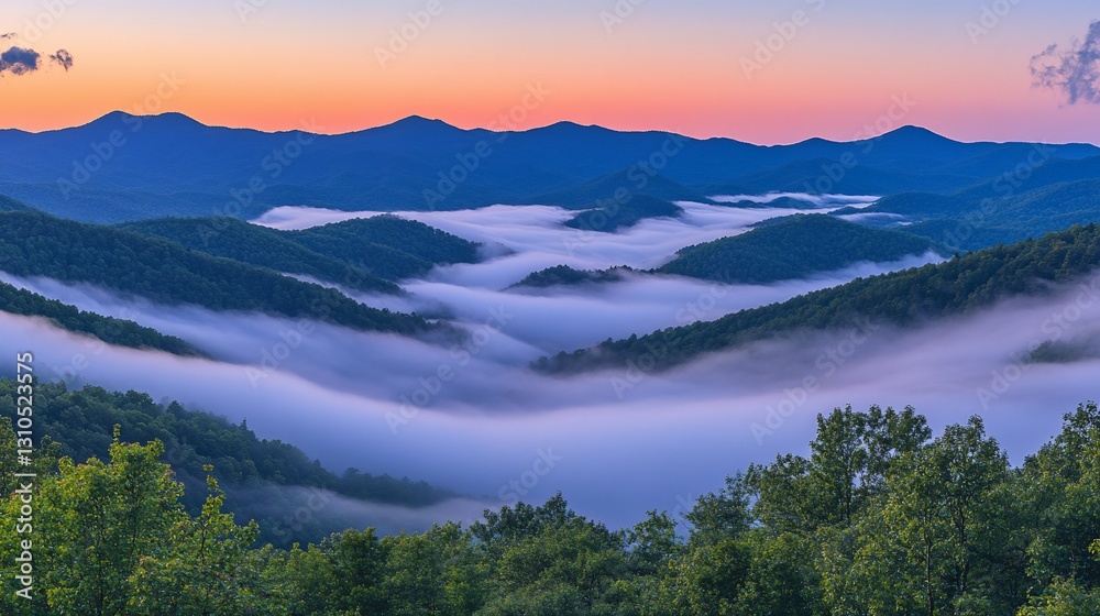 Sunrise over misty mountain valley Sunrise over misty mountain valley