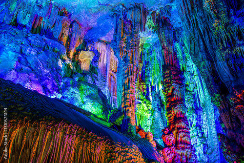 Vászonkép Multicolor lighting in the Reed flute cave, Guilin, Guangxi, China