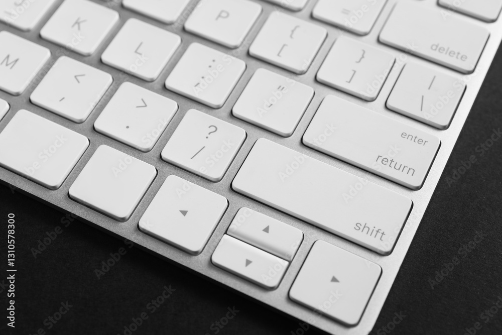 Technical support concept. Modern keyboard on black background, closeup Technical support concept. Modern keyboard on black background, closeup