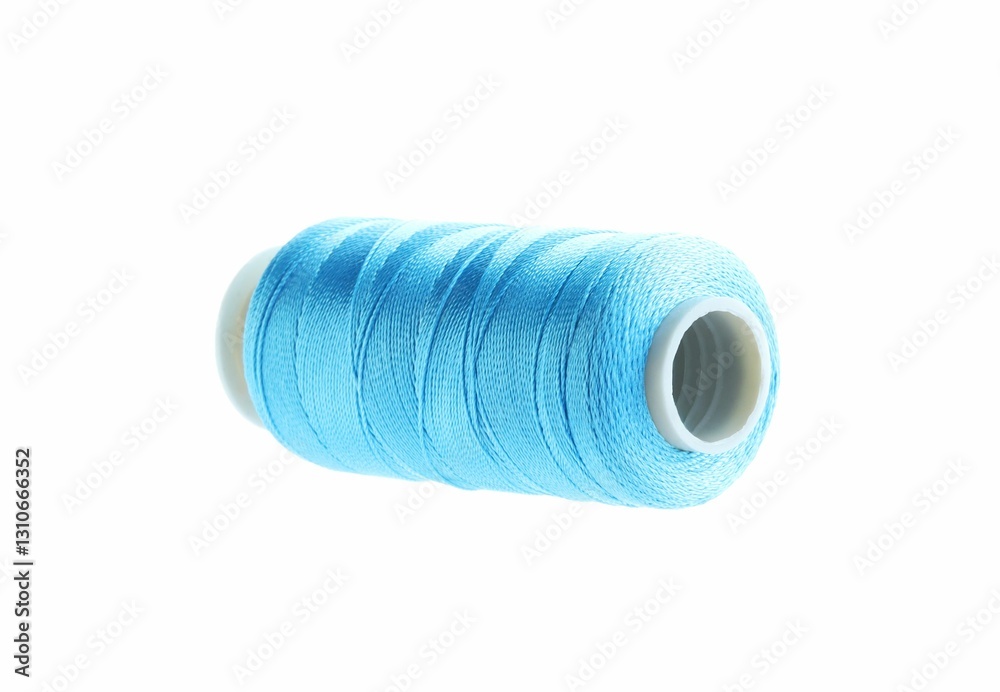 One spool of sewing thread isolated on white One spool of sewing thread isolated on white