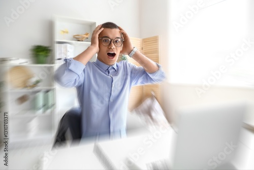 Stressed young businessman ...