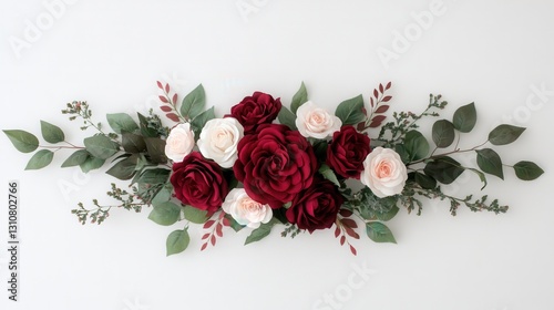 Fototapeta Naklejka Na Ścianę i Meble -  A beautiful arrangement of red and white roses with green leaves, perfect for decoration or as a centerpiece.